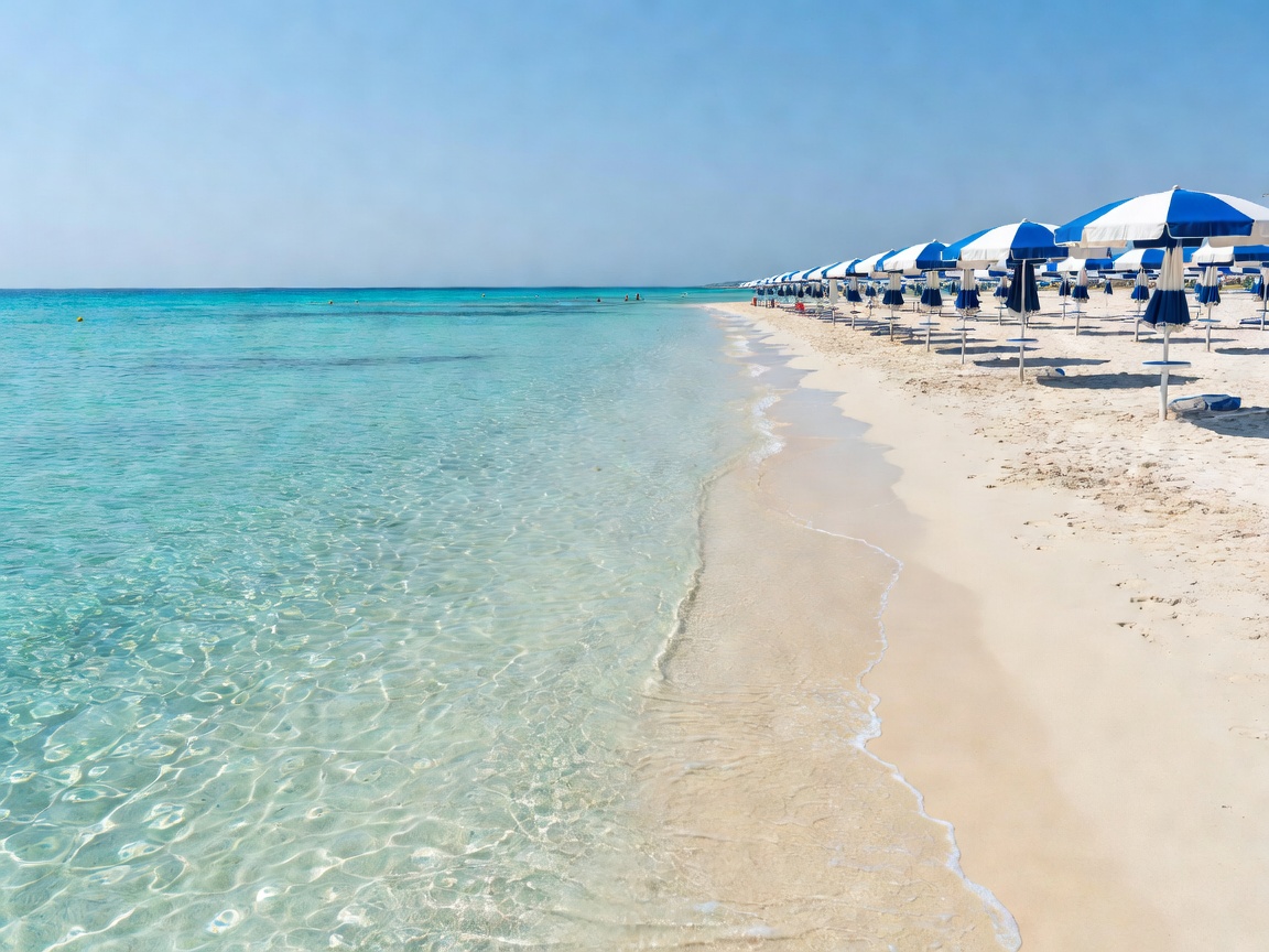 Ayia Napa beach with crystal turquoise waters and beach umbrellas